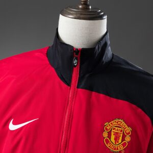 ArtisanFootball proudly presents the M-U 06_07 Windbreaker - Black Edition, a pr