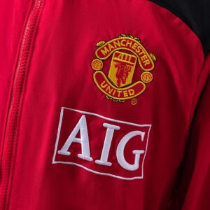 ArtisanFootball proudly presents the M-U 06_07 Windbreaker - Black Edition, a pr