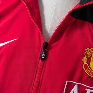 ArtisanFootball proudly presents the M-U 06_07 Windbreaker - Black Edition, a pr