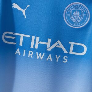 Manchester City 26_27 Home Baby Jersey – Replica Football Soccer Shirt – Size 9–
